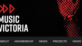 A black and red graphic with a dotted background features the text "MUSIC VICTORIA" prominently in white, accompanied by three red arrows pointing to the right. Below, there is a menu bar with the options: About, Membership, News, Projects, VMDO, and Events.